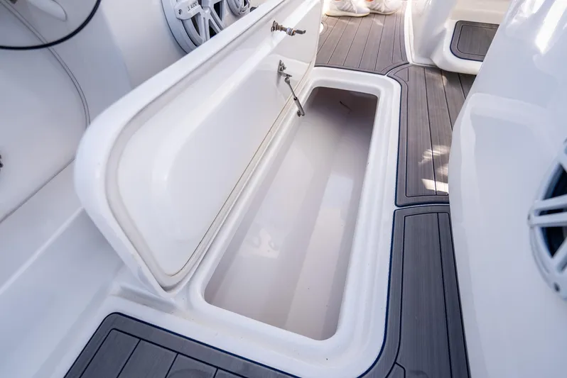  Yacht Photos Pics Open storage compartment on a 2020 Midnight Express 34 Open boat.