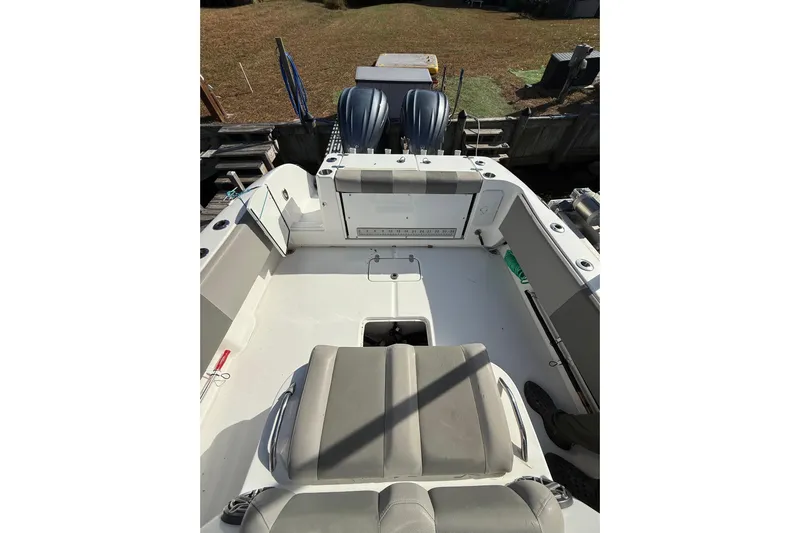  Yacht Photos Pics 2021 Cape Horn 32 XS boat interior with seating and dual outboard motors.