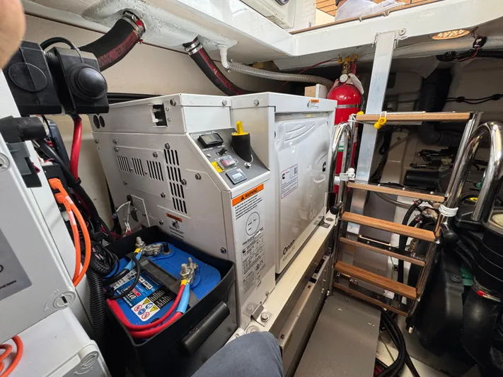 Mamina Yacht Photos Pics Engine room of 2024 Jeanneau DB/43 IB with generator and battery setup.