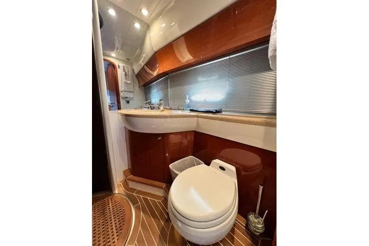  Yacht Photos Pics Luxurious bathroom in 2003 Viking Princess 50 Sport Cruiser yacht with modern fixtures.