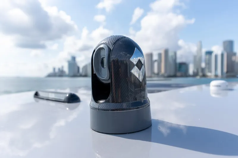  Yacht Photos Pics Rooftop camera on 2026 Deep Impact 499 Sport boat with city skyline background.