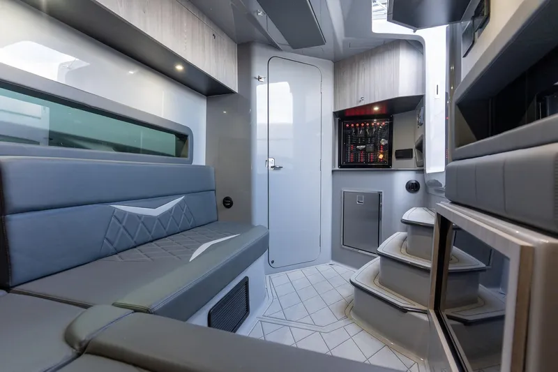  Yacht Photos Pics Interior of 2026 Deep Impact 499 Sport boat, featuring modern seating and sleek design.