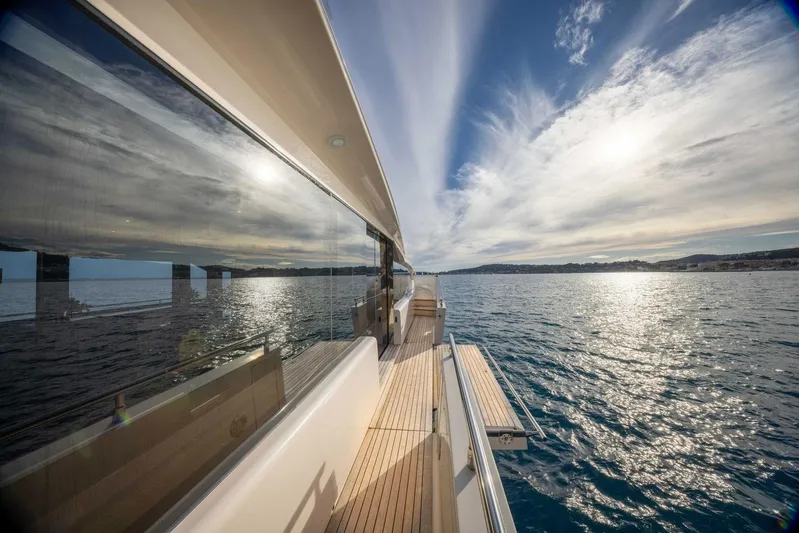 Cecilou Yacht Photos Pics 2018 Sanlorenzo Cayman Yachts F920 cruising on open water under a bright sky.