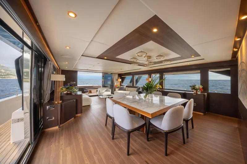 Cecilou Yacht Photos Pics Luxurious interior of 2018 Sanlorenzo Cayman Yachts F920 with elegant dining area and sea view.