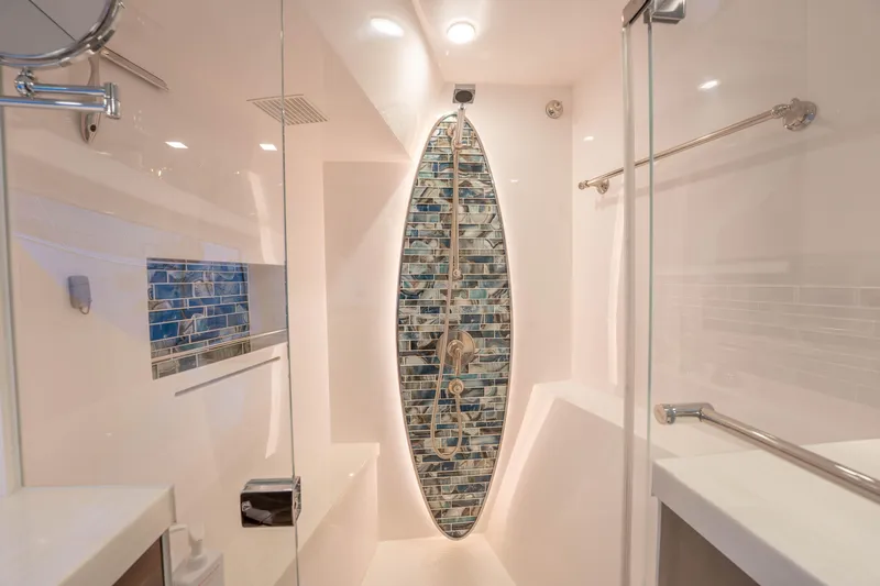 Homarus Yacht Photos Pics Luxurious 2021 Horizon yacht bathroom with modern shower and elegant tile design.