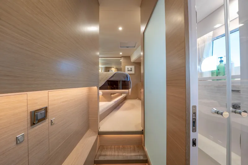 Homarus Yacht Photos Pics Luxurious Horizon yacht interior with modern wood paneling and elegant lighting, 2021 model.