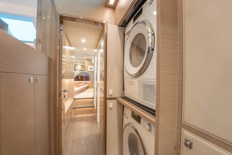 Homarus Yacht Photos Pics Modern yacht interior with stacked washer and dryer, Horizon 2021 model.