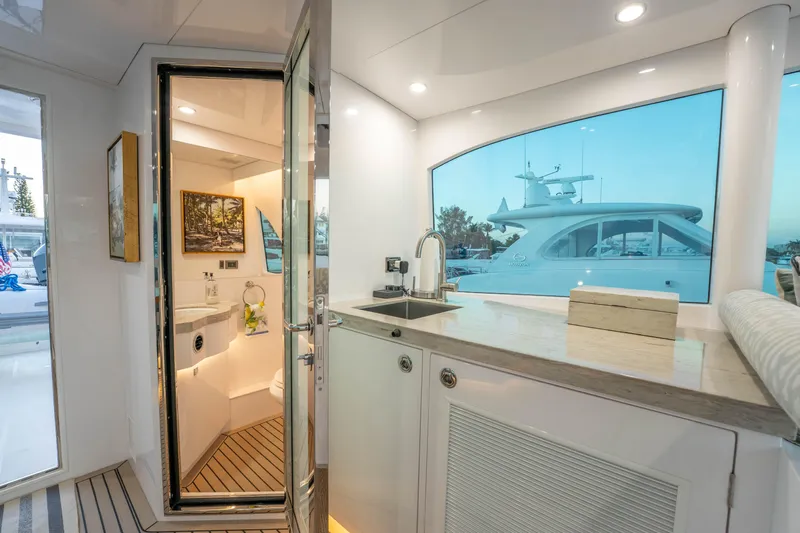 Homarus Yacht Photos Pics Luxurious Horizon yacht interior with modern bathroom and sleek kitchenette, 2021 model.