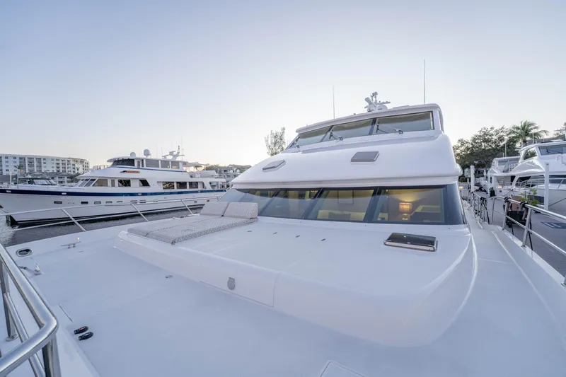 Homarus Yacht Photos Pics Luxury Horizon yacht docked at marina, 2021 model, with spacious deck and modern design.