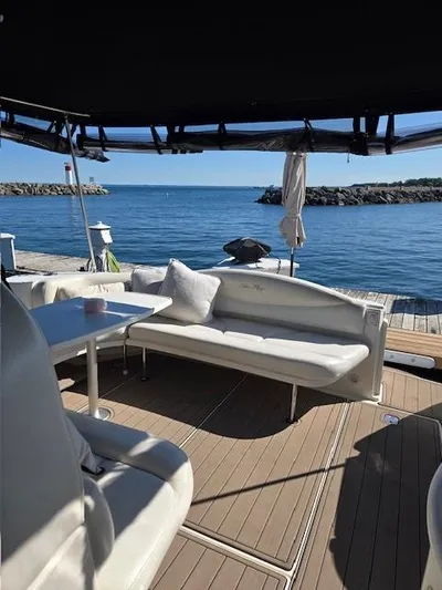 2 Spicy Yacht Photos Pics 2003 Sea Ray 380 Sundancer yacht interior with ocean view and seating area.