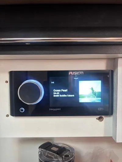 2 Spicy Yacht Photos Pics Fusion stereo system on a 2003 Sea Ray 380 Sundancer displaying "Ocean Pearl" by 54-40.