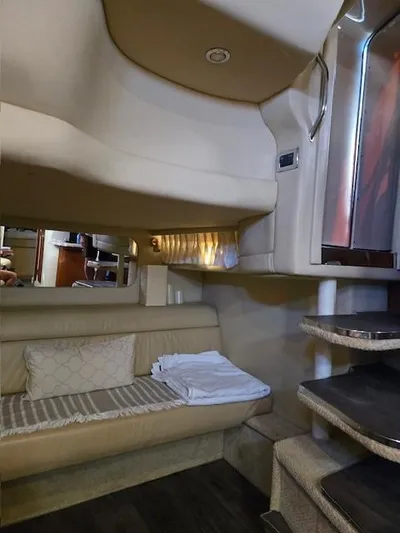 2 Spicy Yacht Photos Pics Interior of 2003 Sea Ray 380 Sundancer yacht, featuring cozy seating and elegant design.