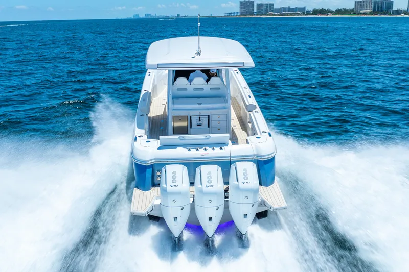  Yacht Photos Pics 2025 Intrepid 41 Panacea boat cruising on open water with powerful engines.