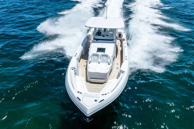  Yacht Photos Pics 2025 Intrepid 41 Panacea cruising on open water, showcasing sleek design and powerful performance.
