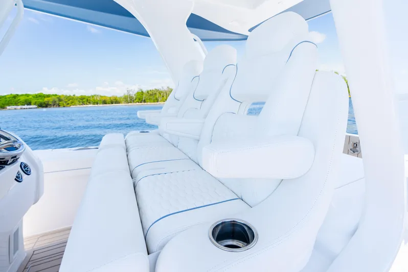  Yacht Photos Pics Luxurious seating on 2025 Intrepid 41 Panacea yacht with ocean view.