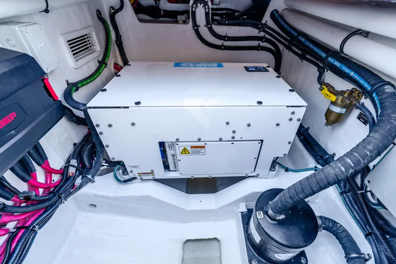  Yacht Photos Pics Engine room of 2025 Intrepid 41 Panacea boat, featuring advanced mechanical systems and wiring.