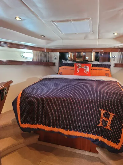  Yacht Photos Pics Luxurious cabin interior of 2003 Sea Ray 680 Sun Sport yacht with elegant bedding.