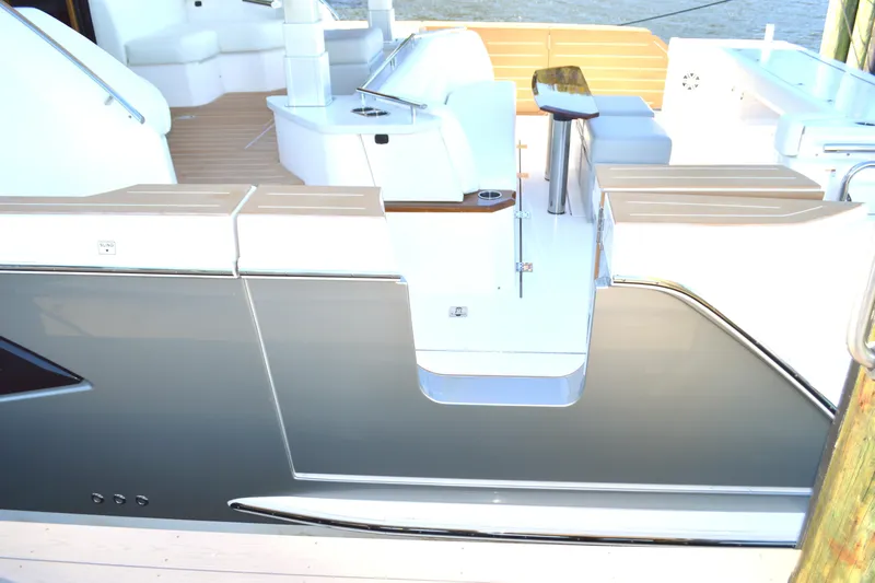 Jack's Boat Yacht Photos Pics 2024 Tiara Yachts EX 60 luxury yacht deck with sleek design and modern amenities.