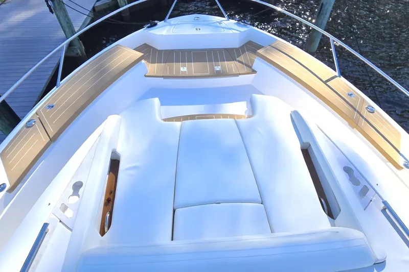 Jack's Boat Yacht Photos Pics 2024 Tiara Yachts EX 60 deck with luxurious seating and sleek design.