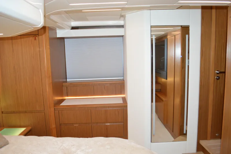 Jack's Boat Yacht Photos Pics Luxurious interior of 2024 Tiara Yachts EX 60, featuring elegant wood finishes and modern design.