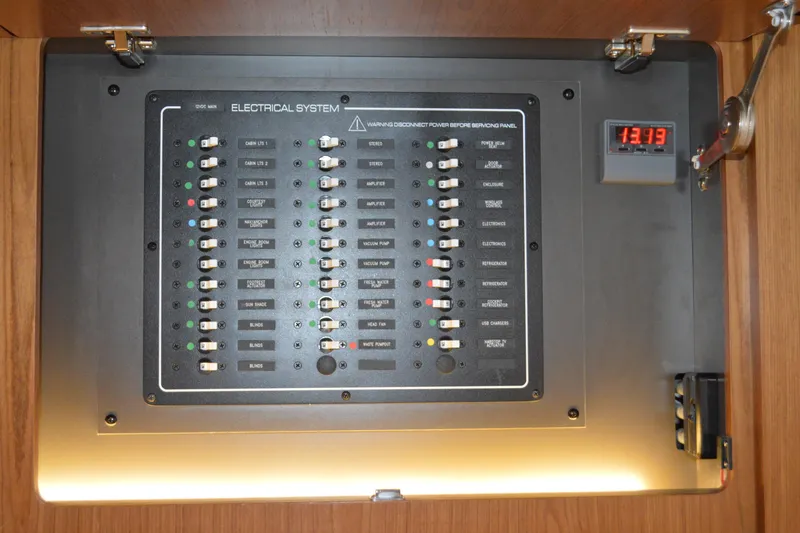 Jack's Boat Yacht Photos Pics Electrical panel of 2024 Tiara Yachts EX 60, showcasing various system controls.