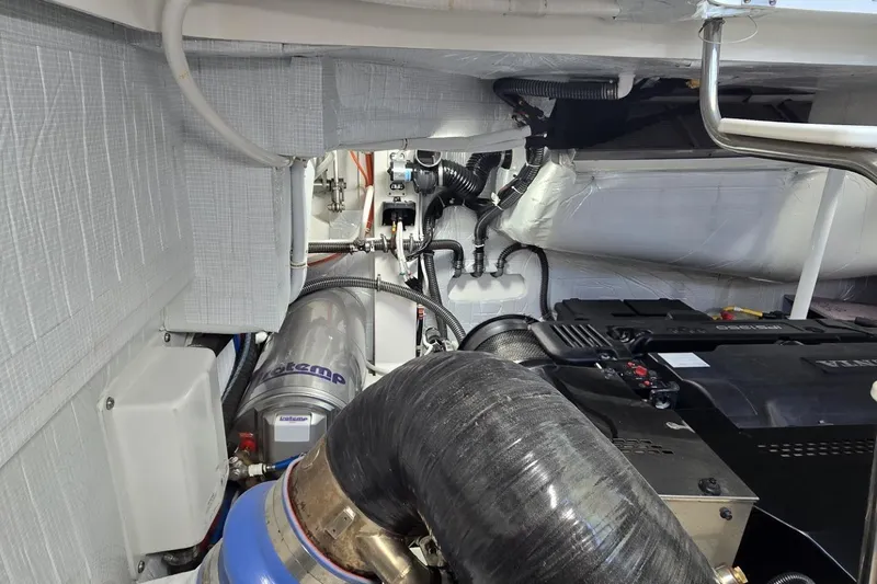 Jack's Boat Yacht Photos Pics Engine room of 2024 Tiara Yachts EX 60, showcasing mechanical components and systems.
