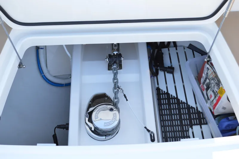 Jack's Boat Yacht Photos Pics Anchor compartment of 2024 Tiara Yachts EX 60 with chain and storage items.