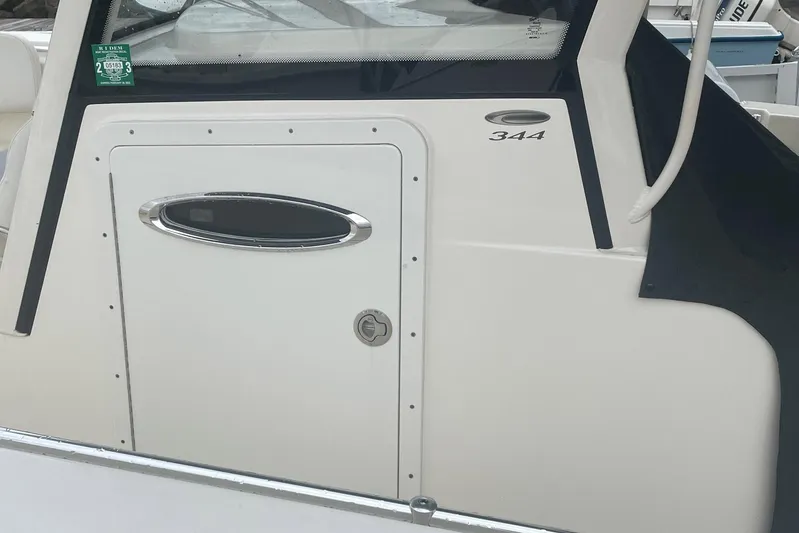 Pier Pressure Yacht Photos Pics 2018 Cobia 344 Center Console boat, featuring sleek design and modern detailing.