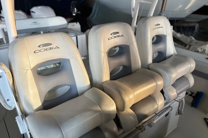 Pier Pressure Yacht Photos Pics 2018 Cobia 344 Center Console boat seats, featuring premium leather upholstery.