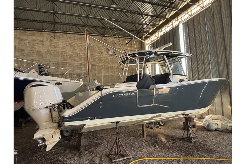 Pier Pressure Yacht Photos Pics 2018 Cobia 344 Center Console boat in storage, side view.