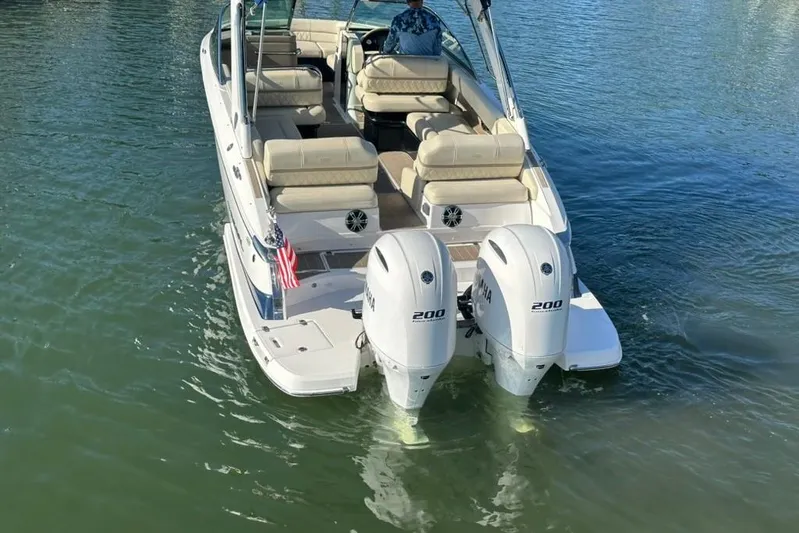  Yacht Photos Pics 2019 Regal 29 OBX boat with twin Yamaha 200 engines on calm water.