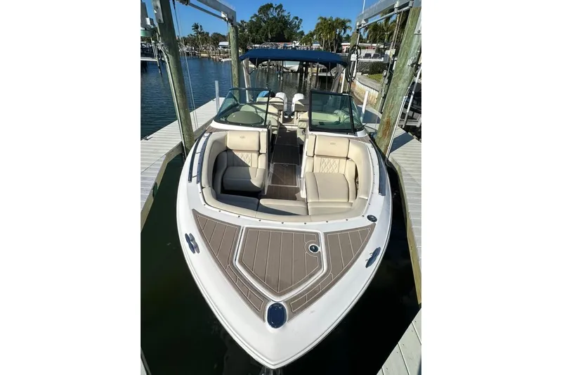  Yacht Photos Pics 2019 Regal 29 OBX boat docked, featuring spacious seating and sleek design.