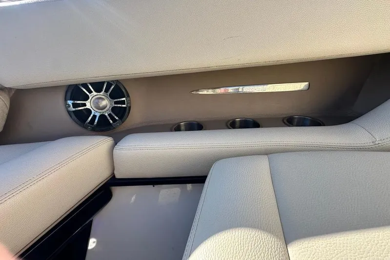  Yacht Photos Pics 2019 Regal 29 OBX boat interior with speaker and cup holders.