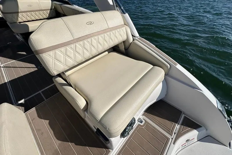  Yacht Photos Pics Luxurious seating on 2019 Regal 29 OBX boat with water view.