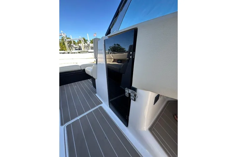  Yacht Photos Pics 2019 Regal 29 OBX boat interior with sleek seating and modern design.