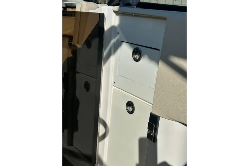  Yacht Photos Pics 2019 Regal 29 OBX boat interior storage compartments with sleek design.