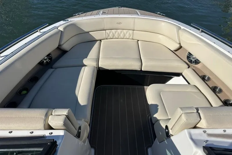  Yacht Photos Pics Luxurious seating area on a 2019 Regal 29 OBX boat, featuring beige upholstery.