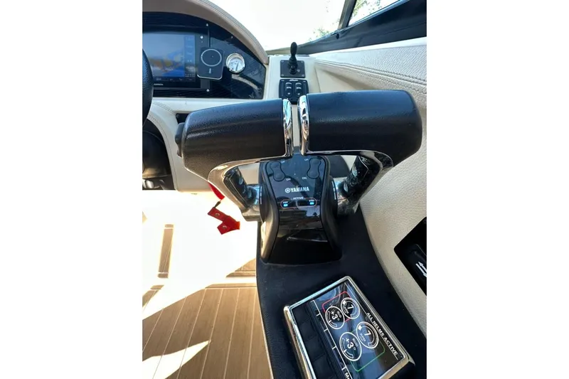  Yacht Photos Pics 2019 Regal 29 OBX boat cockpit with Yamaha controls and dashboard display.