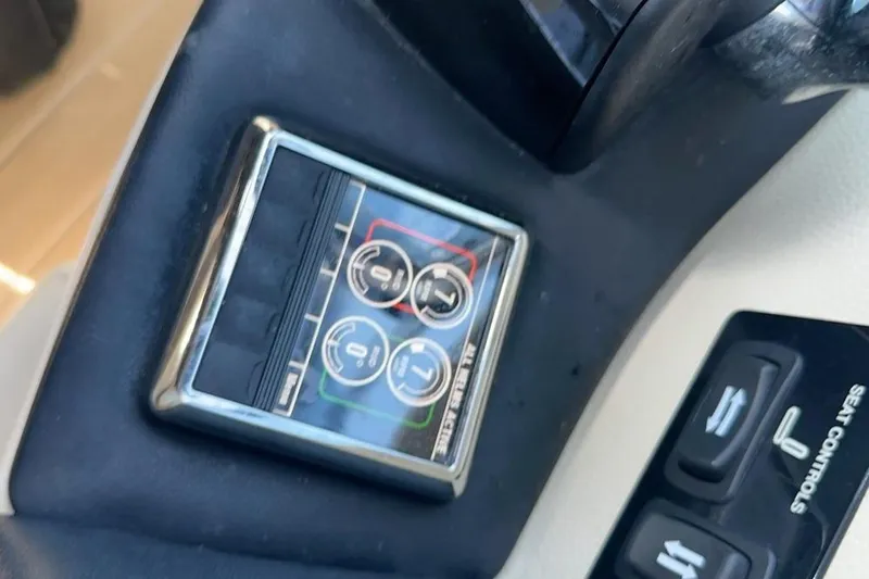  Yacht Photos Pics Control panel of a 2019 Regal 29 OBX boat with seat adjustment buttons.