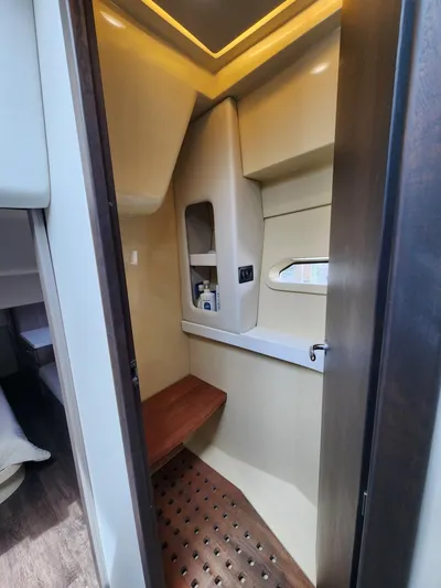 Dilligaf Yacht Photos Pics 2020 Regal 38 XO yacht interior bathroom with modern design and wooden accents.
