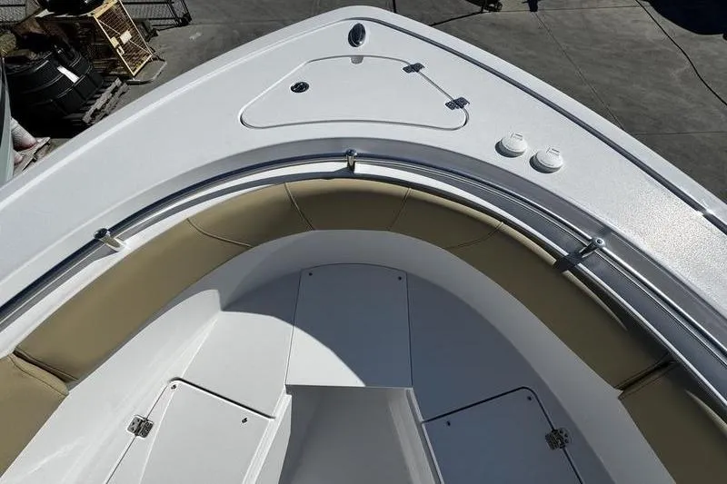  Yacht Photos Pics 2026 Sportsman Open 252 Center Console boat, featuring spacious bow seating and storage compartments.