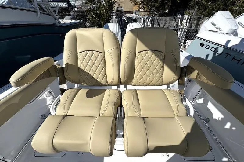  Yacht Photos Pics 2026 Sportsman Open 252 Center Console boat with beige leather seats.