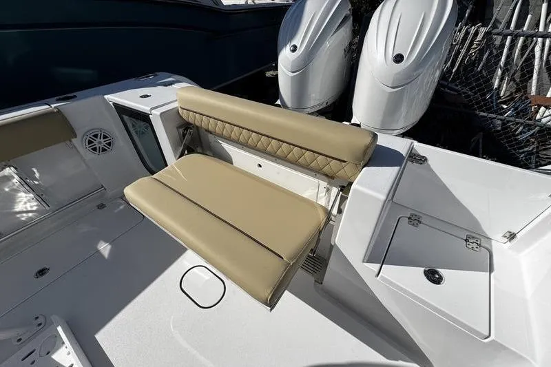  Yacht Photos Pics 2026 Sportsman Open 252 Center Console boat with tan seating and dual engines.