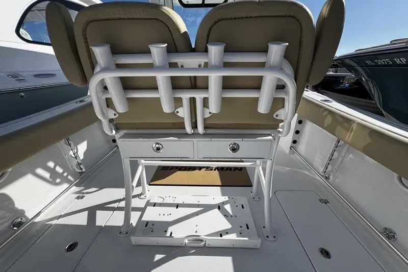  Yacht Photos Pics 2026 Sportsman Open 252 Center Console boat interior with rod holders and seating.