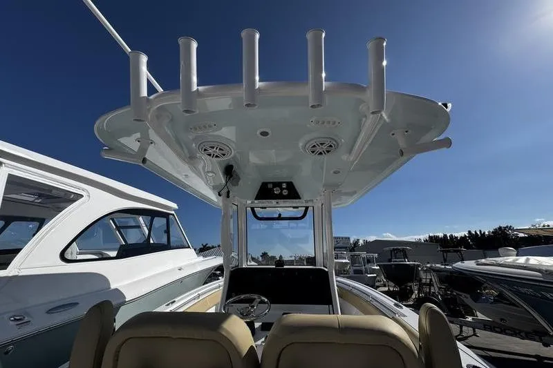  Yacht Photos Pics 2026 Sportsman Open 252 Center Console boat, featuring a sleek design and modern amenities.