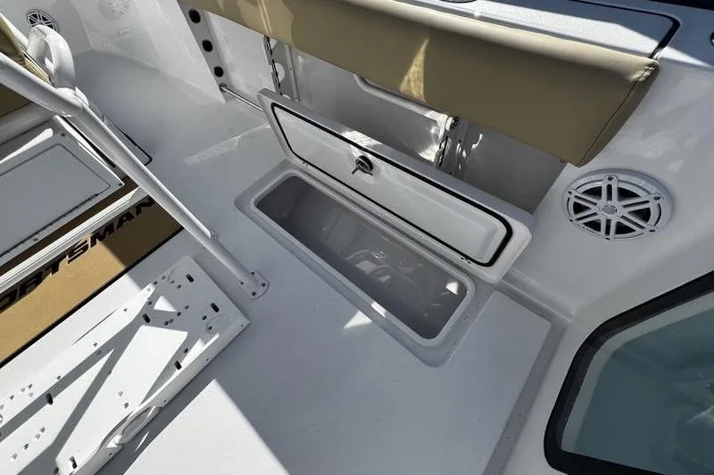  Yacht Photos Pics 2026 Sportsman Open 252 Center Console boat interior with storage compartment and seating.