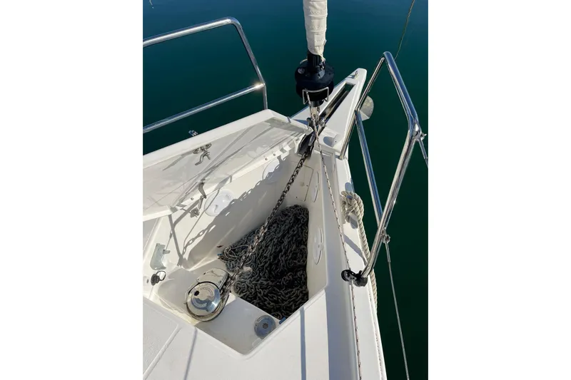  Yacht Photos Pics Bow of 2020 Dufour 390 sailboat with anchor chain and winch.