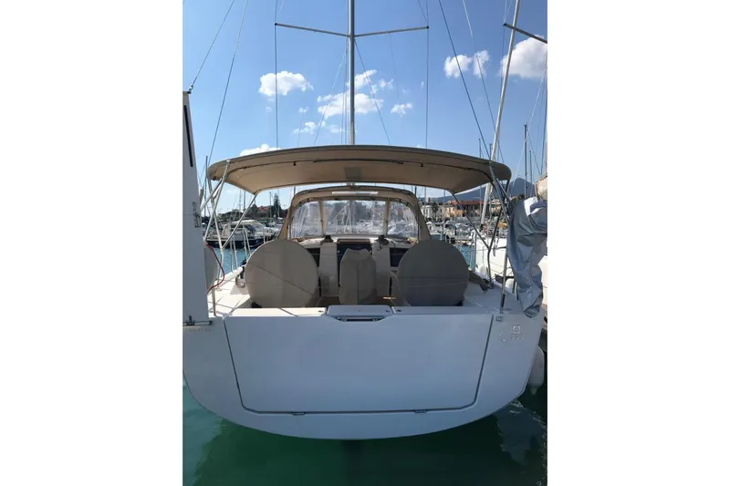  Yacht Photos Pics 2020 Dufour Yachts 390 Grand Large sailboat docked in marina, rear view.