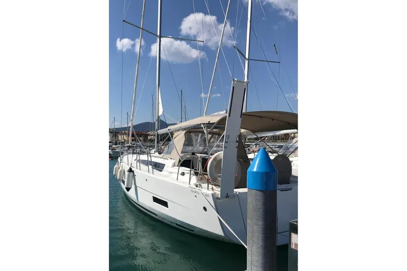  Yacht Photos Pics 2020 Dufour Yachts 390 Grand Large sailboat docked in marina under clear sky.