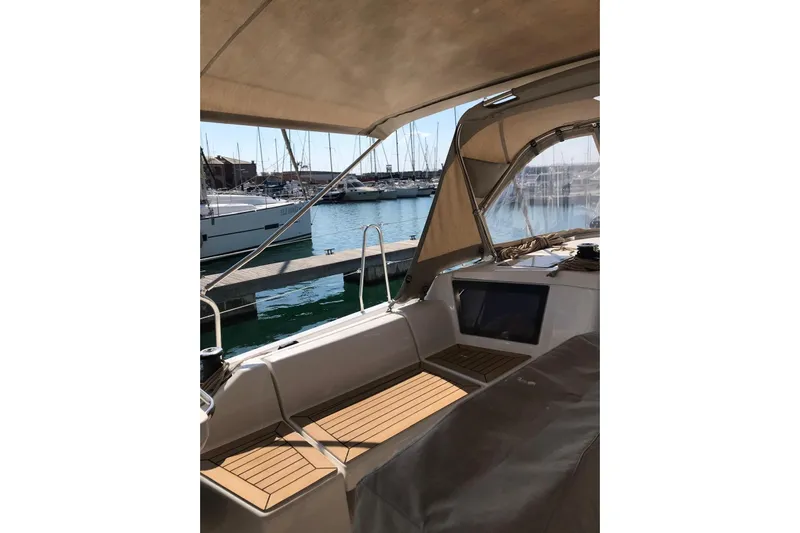  Yacht Photos Pics 2020 Dufour Yachts 390 Grand Large sailboat interior with marina view.